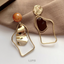 Lupis Assymetrical Earrings