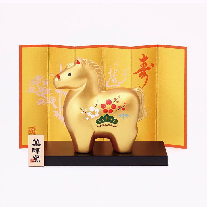 Yakushigama Gold Year of the Horse Ornament with Pine, Bamboo, and Plum Design